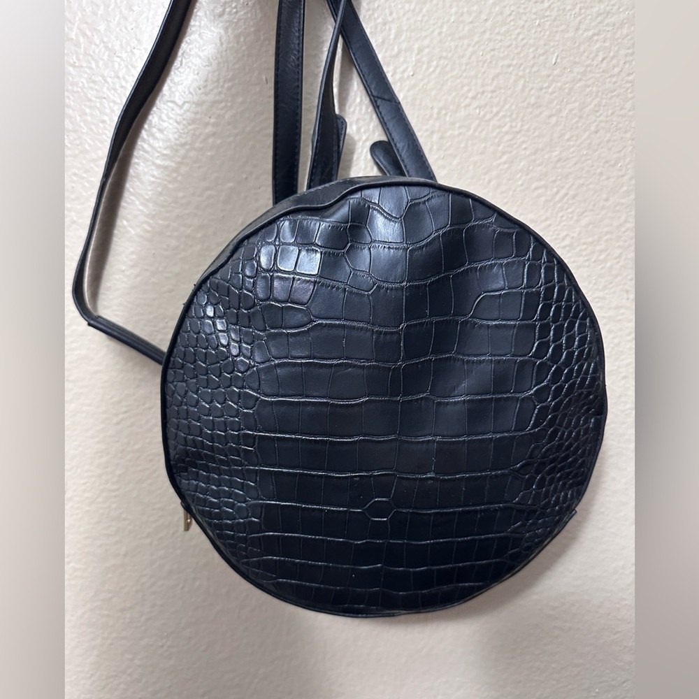 Kaari blue croc material convertible backpack and crodsbody